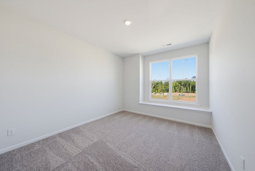 Spacious, unfurnished interior of a new home in Sweetbrier, Durham (Image 26).