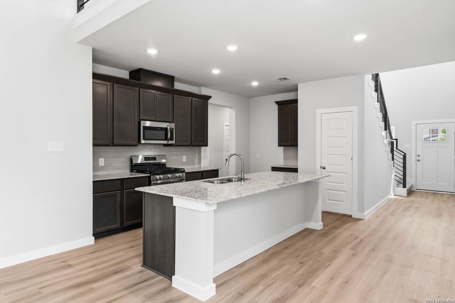 Furnished interior view inside a new home in Hickory Ridge, Elmendorf (Image 8).