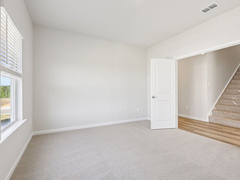 Spacious, unfurnished interior of a new home in Moss Farms, Lula (Image 17).