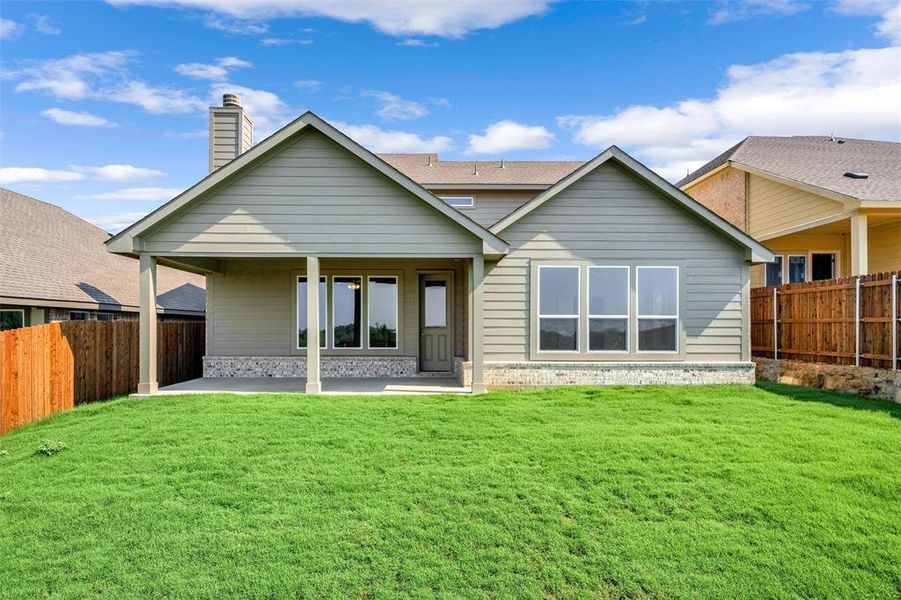 Front exterior of a new home in Liberty Pointe, Gainesville, TX, highlighting curb appeal (Image 22). Front exterior of a new home in Liberty Pointe, Gainesville, TX, highlighting curb appeal (Image 22).