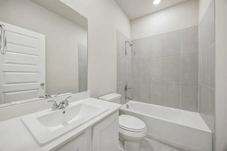 Bathroom in the Wimbledon home plan by Trophy Signature Homes – REPRESENTATIVE PHOTO Bathroom in the Wimbledon home plan by Trophy Signature Homes – REPRESENTATIVE PHOTO