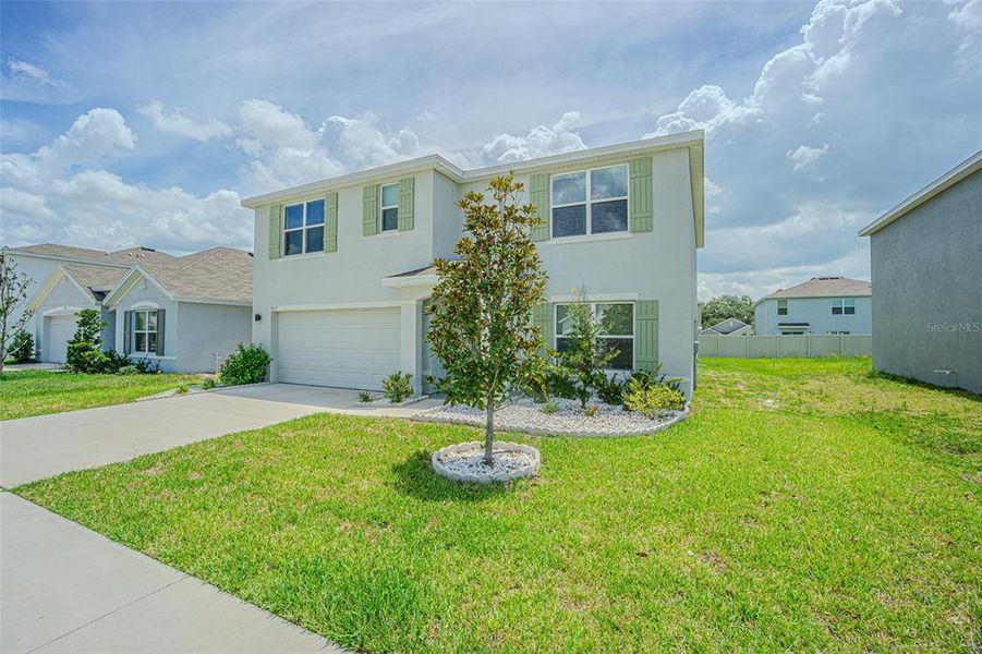 Front exterior of a new home in , Temple Terrace, FL, highlighting curb appeal (Image 2). Front exterior of a new home in , Temple Terrace, FL, highlighting curb appeal (Image 2).