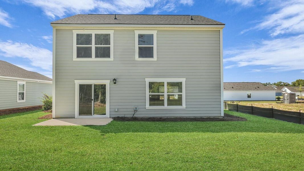 Exterior details and patio area of a home in Center Pointe, Santee (Image 4).