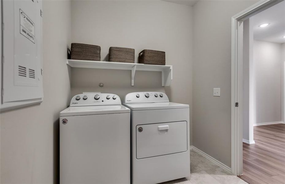 Roomy laundry room *Photos of furnished model. Not actual home. Representative of floor plan. Some options and features may vary