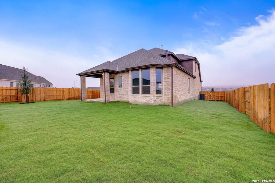Exterior details and patio area of a home in Homestead, Schertz (Image 2). Exterior details and patio area of a home in Homestead, Schertz (Image 2).