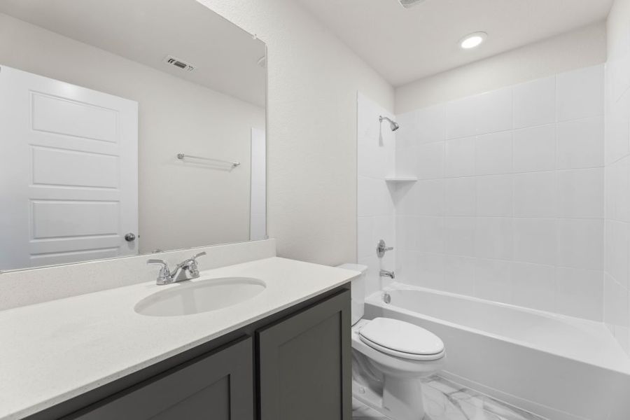 Representative exterior photo of a completed home built from the Lavon by Impression Homes in Timber Ridge, Corinth, TX (Image 21).