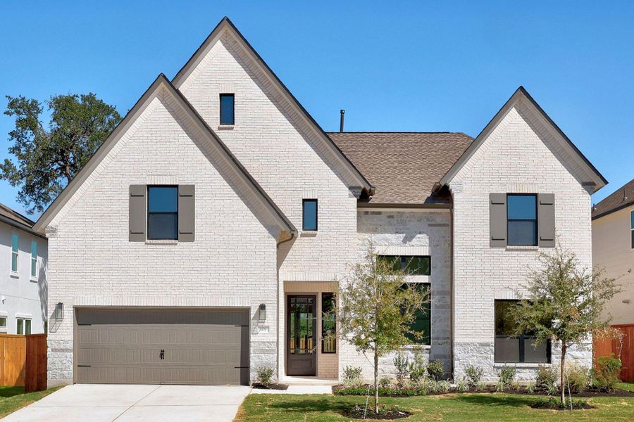 Front exterior of a new home in Parmer Ranch, Georgetown, TX, highlighting curb appeal (Image 2). Front exterior of a new home in Parmer Ranch, Georgetown, TX, highlighting curb appeal (Image 2).