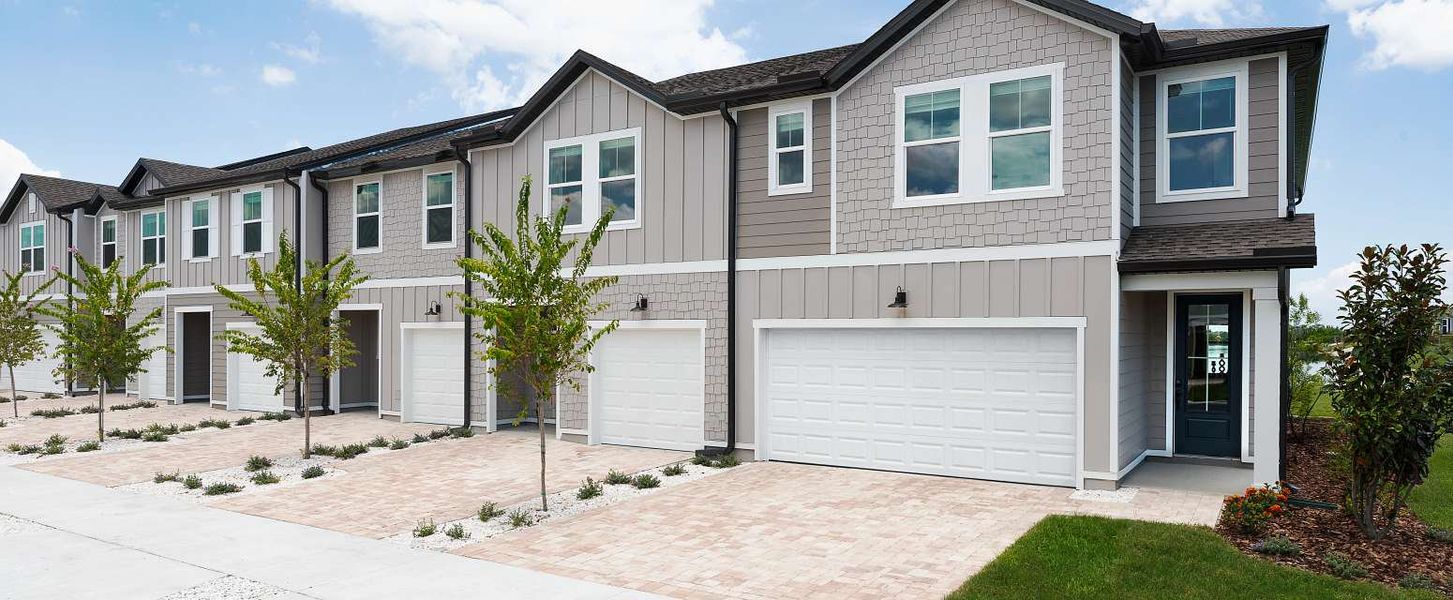 Representative exterior photo of a completed home built from the Beach by Ashton Woods in Catamaran Cove Townhomes, Rockledge, FL (Image 2).