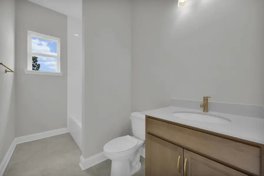 Representative furnished interior of a home built from the Tomoka by Riverside Homes in Hidden Creek at SilverLeaf Phase 1, St. Augustine (Image 19).