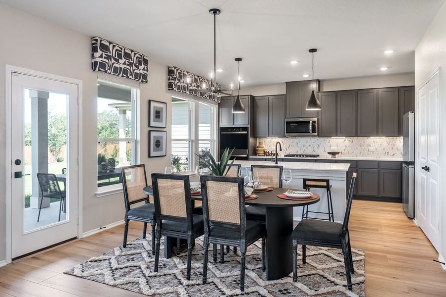Representative furnished interior of a home built from the 2429 Modeled by KB Home in River Bluff, Leander (Image 5).