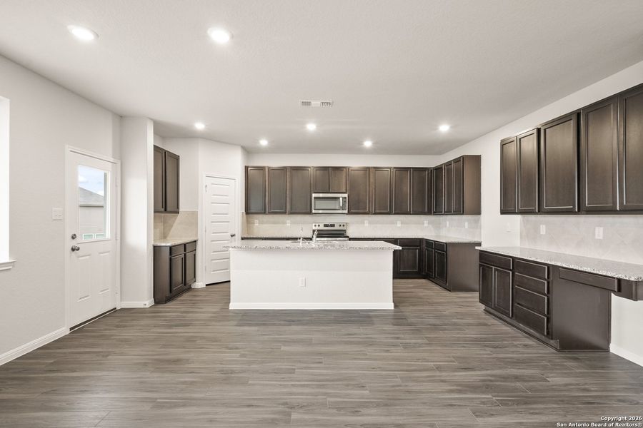 Furnished interior view inside a new home in Cinco Lakes, San Antonio (Image 9).