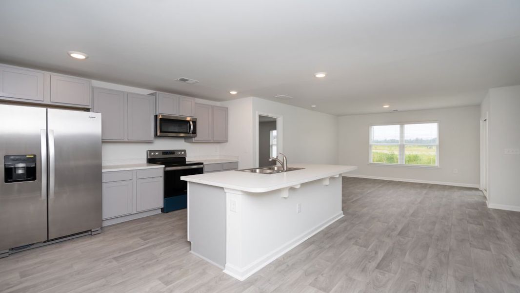 Representative furnished interior of a home built from the ARIA by D.R. Horton in The Meadows at Wildwood Village, Shallotte (Image 5). Representative furnished interior of a home built from the ARIA by D.R. Horton in The Meadows at Wildwood Village, Shallotte (Image 5).