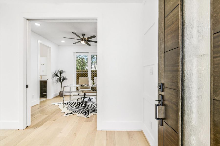 Step inside through the sleek, modern front doorand immediately experience the sophistication ofthis architect-designed home. Warm European oakflooring, clean white walls, and custom trimworkcreate a crisp, inviting entry. The front-facing studyoffers privacy and convenience—perfect forexecutives or medical professionals workingremotely or taking calls between hospital rounds.