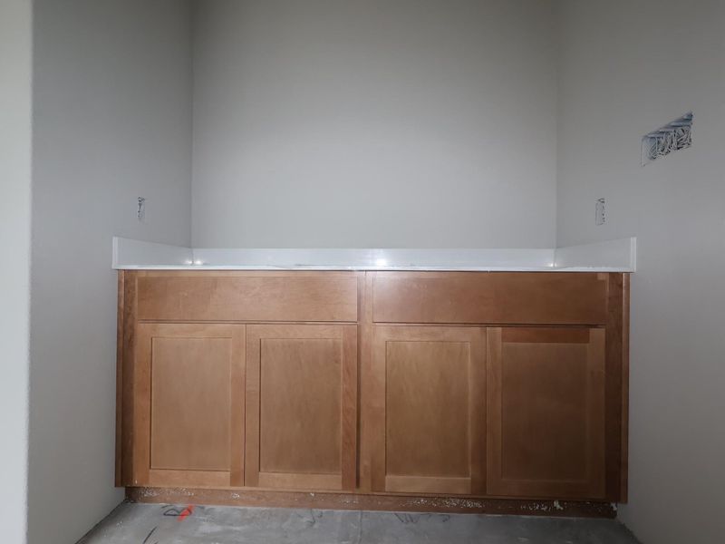 In-progress construction of a new home in Carillon, Manor, TX (Image 8).
