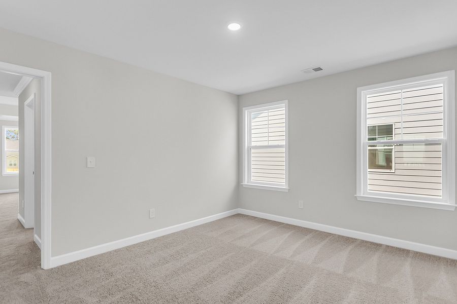 Spacious, unfurnished interior of a new home in Pineland Preserve, Summerville (Image 40).