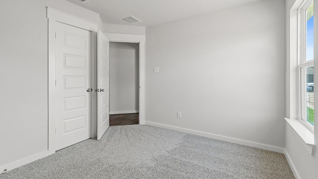 Representative furnished interior of a home built from the Kimbell by Brightland Homes in Sunterra, Katy (Image 13).
