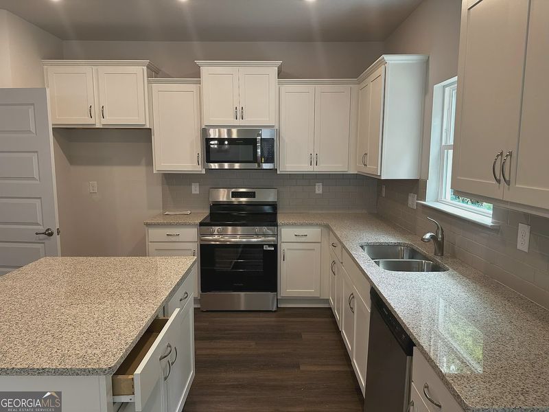 Furnished interior view inside a new home in Canterbury Villas, Carrollton (Image 6).