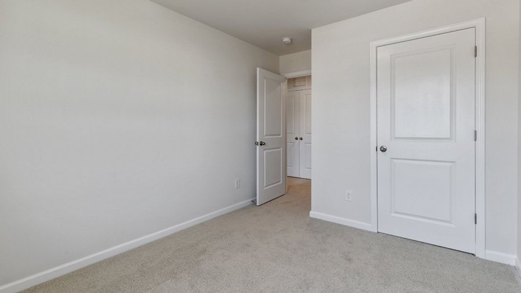 Spacious, unfurnished interior of a new home in The Townes at Wilson's Ridge, Smithfield (Image 20).