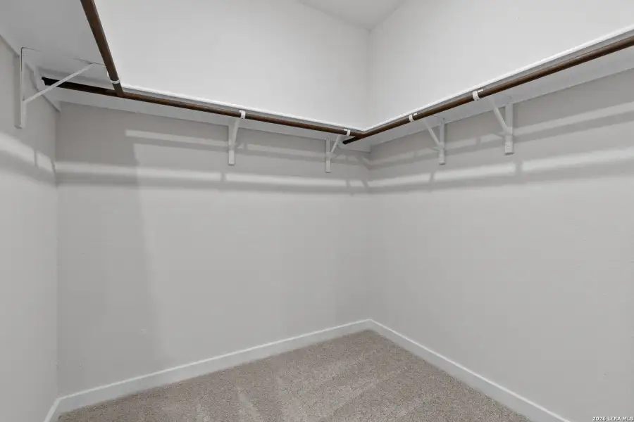 Spacious, unfurnished interior of a new home in Hacienda, San Antonio (Image 17).