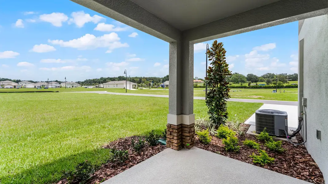 Exterior details and patio area of a home in Windrose, Apopka (Image 3).