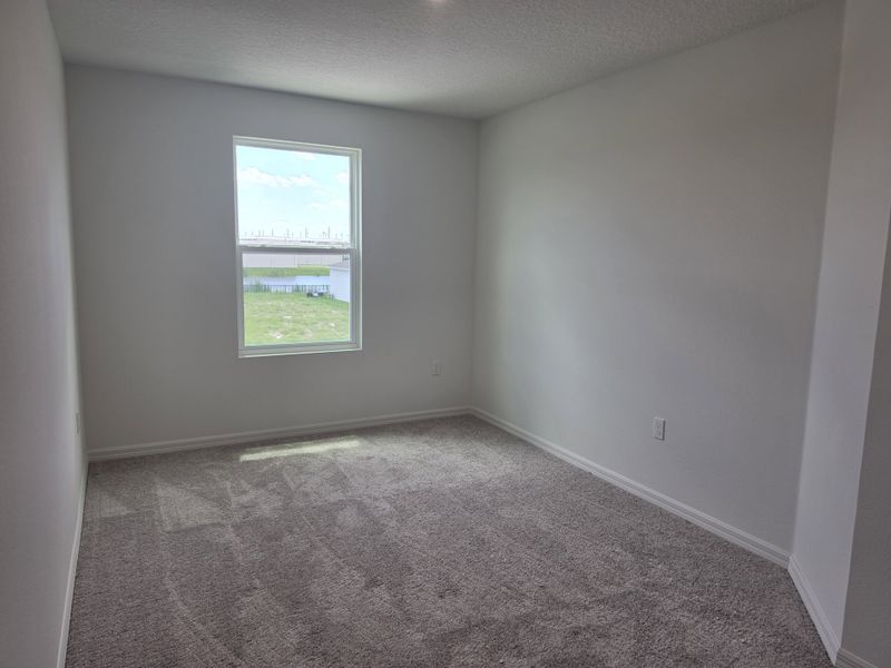 Spacious, unfurnished interior of a new home in Lake Deer Estates, Poinciana (Image 11). Spacious, unfurnished interior of a new home in Lake Deer Estates, Poinciana (Image 11).