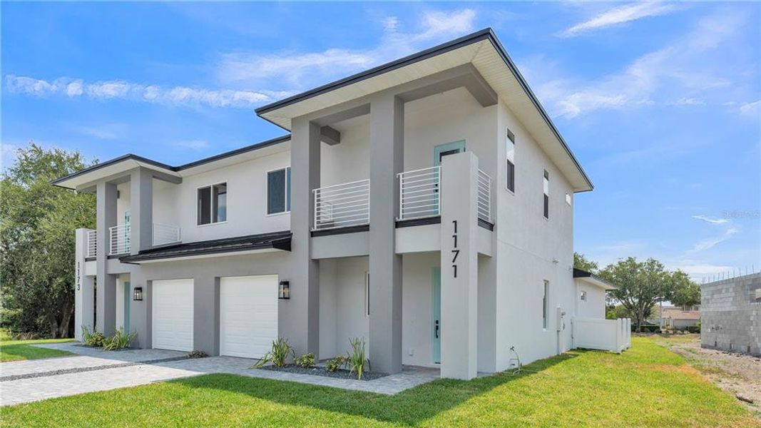 Front exterior of a new home in , Lakeland, FL, highlighting curb appeal (Image 22). Front exterior of a new home in , Lakeland, FL, highlighting curb appeal (Image 22).