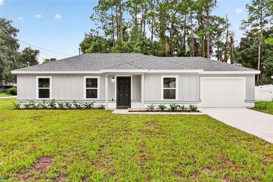 Front exterior of a new home in , Ocala, FL, highlighting curb appeal (Image 1). Front exterior of a new home in , Ocala, FL, highlighting curb appeal (Image 1).