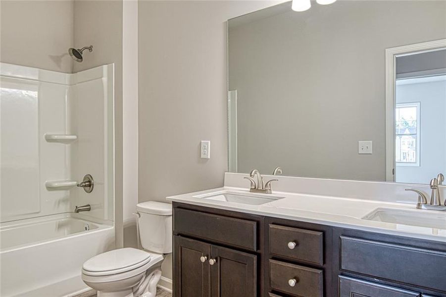 Furnished interior view inside a new home in Enclave at Logan Point, Loganville (Image 12).