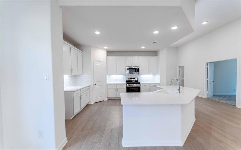 Furnished interior view inside a new home in La Terra, Celina (Image 5). Furnished interior view inside a new home in La Terra, Celina (Image 5).
