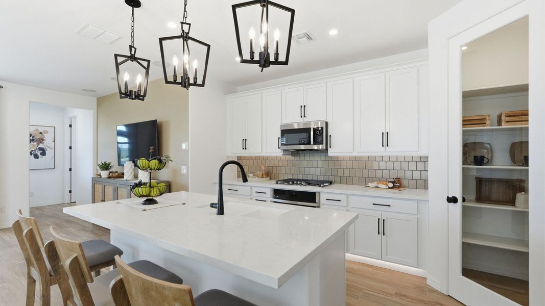 Representative furnished interior of a home built from the Bluebell by DRB Homes in Apache Farms, Buckeye (Image 8).