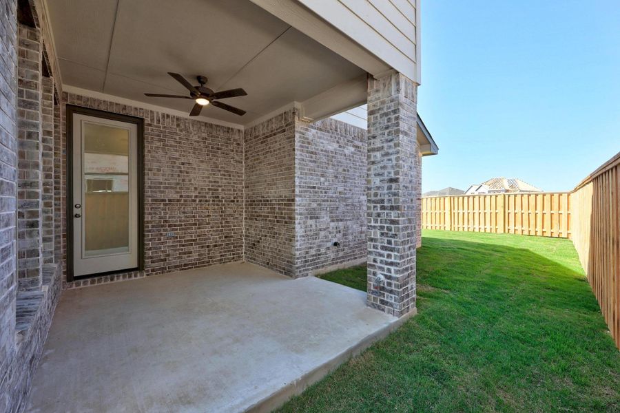 Exterior details and patio area of a home in Parmer Ranch - 40', Georgetown (Image 21).
