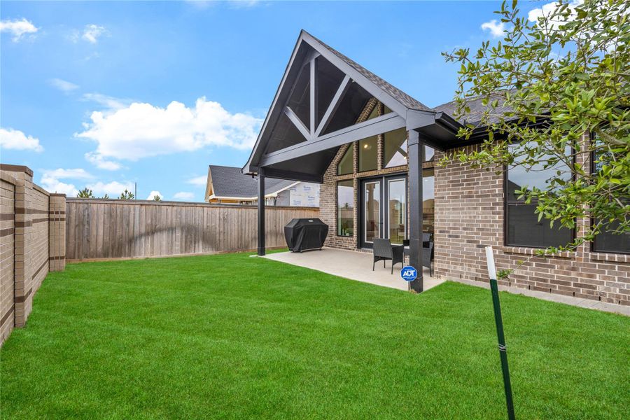 Exterior details and patio area of a home in , Cypress (Image 3).