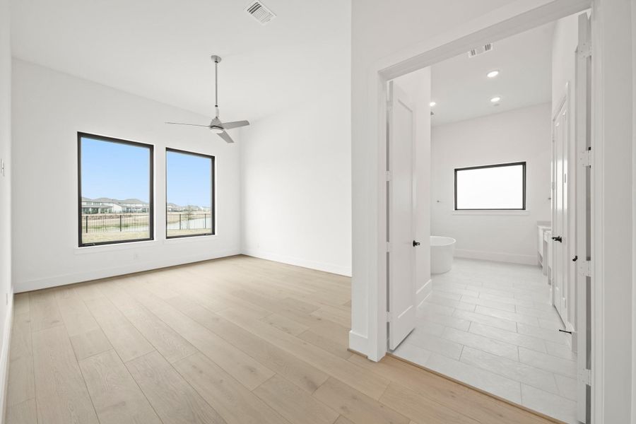 Spacious, unfurnished interior of a new home in Bridgeland, Cypress (Image 40).