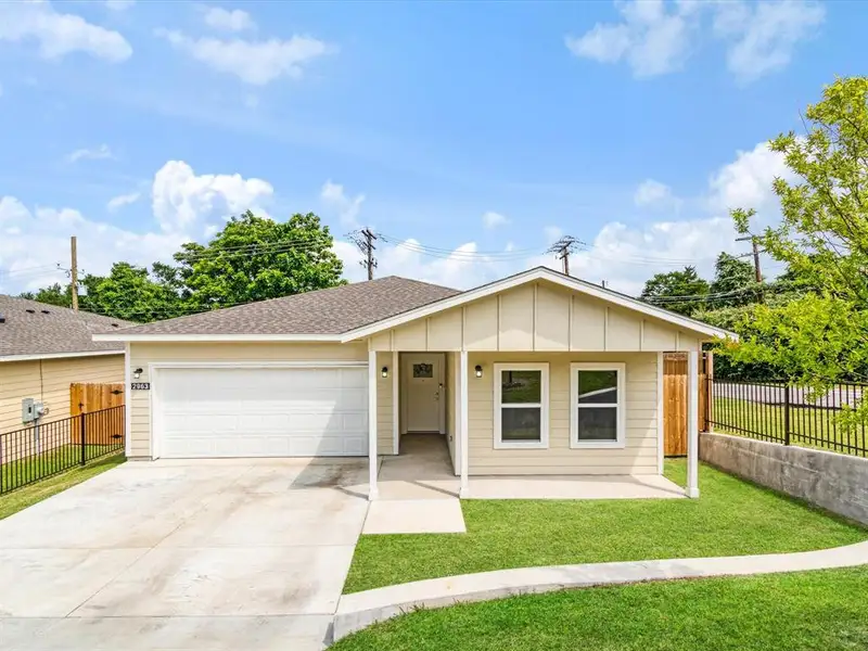 Front exterior of a new home in , Dallas, TX, highlighting curb appeal (Image 24).