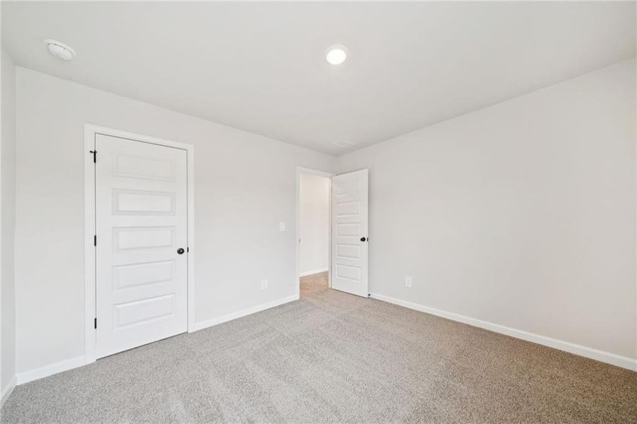 Spacious, unfurnished interior of a new home in Vines at Mill Creek - Estate Series, Braselton (Image 20).