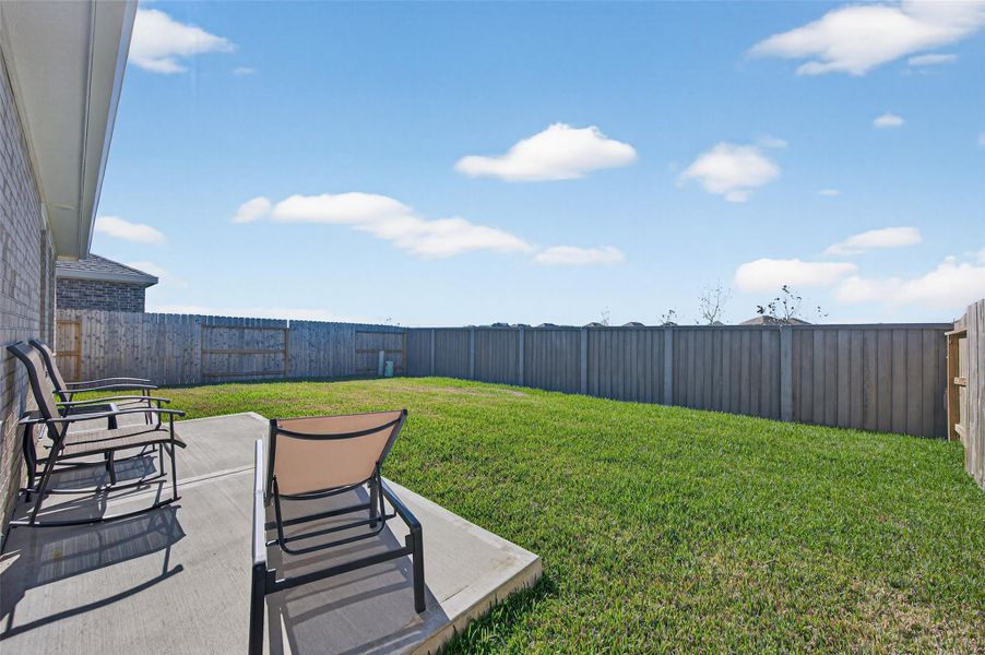 Exterior details and patio area of a home in The Grand Prairie, Hockley (Image 25).