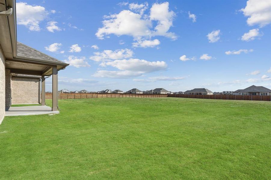 Exterior details and patio area of a home in Ellis Ranch Estates, Waxahachie (Image 3).