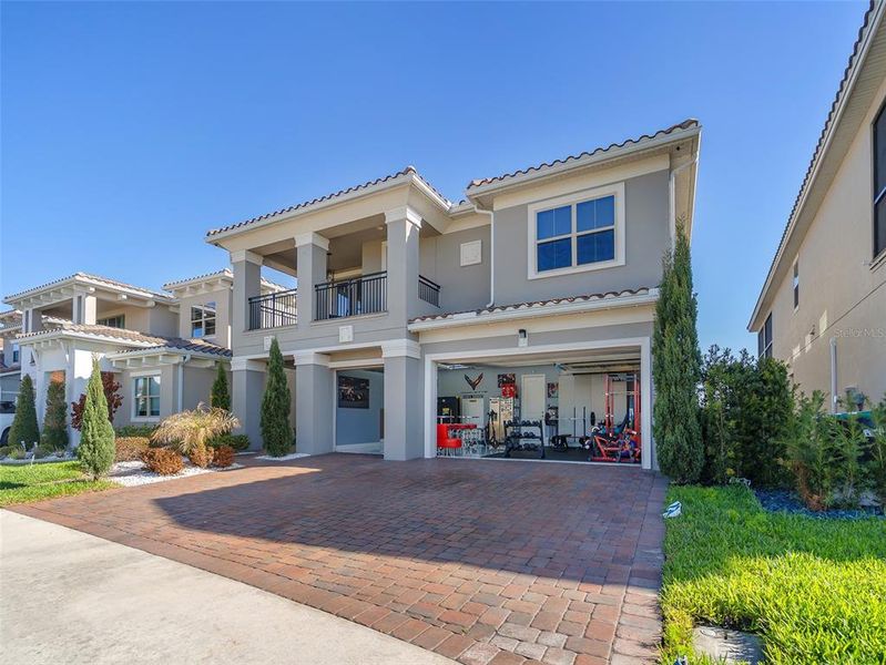 Front exterior of a new home in , Orlando, FL, highlighting curb appeal (Image 29).