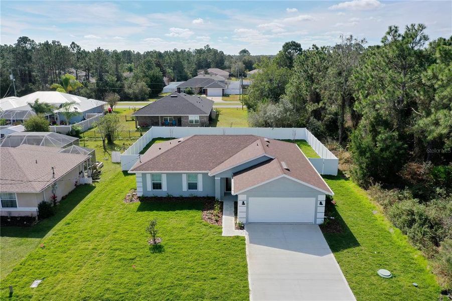Front exterior of a new home in , Palm Coast, FL, highlighting curb appeal (Image 18).
