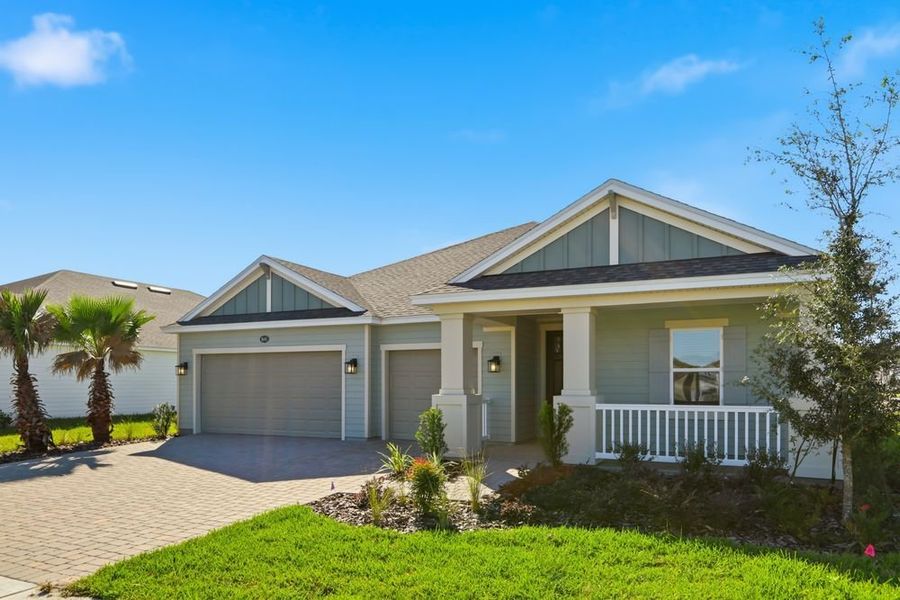 Front exterior of a new home in Headwaters at Lofton Creek, Yulee, FL, highlighting curb appeal (Image 2). Front exterior of a new home in Headwaters at Lofton Creek, Yulee, FL, highlighting curb appeal (Image 2).