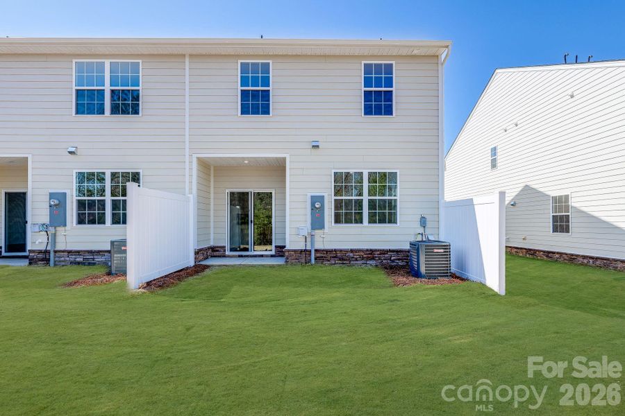 Exterior details and patio area of a home in Cannon Village, York (Image 3).