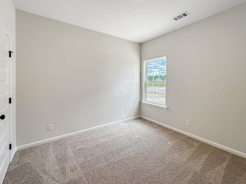 Spacious, unfurnished interior of a new home in Doctor's Creek, Ludowici (Image 20).