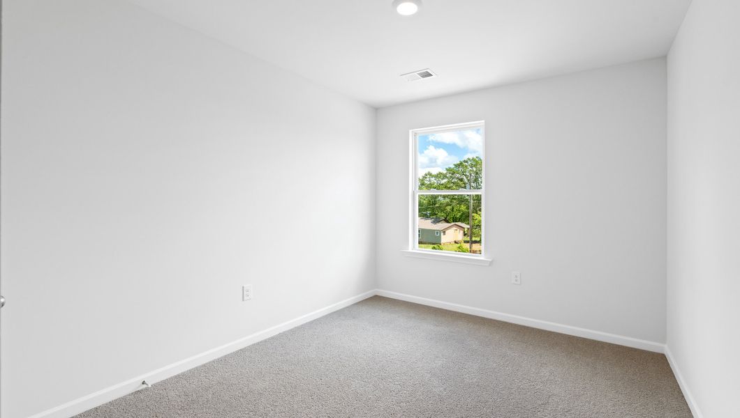 Spacious, unfurnished interior of a new home in Chestnut Ridge Townhomes, Greenville (Image 18).