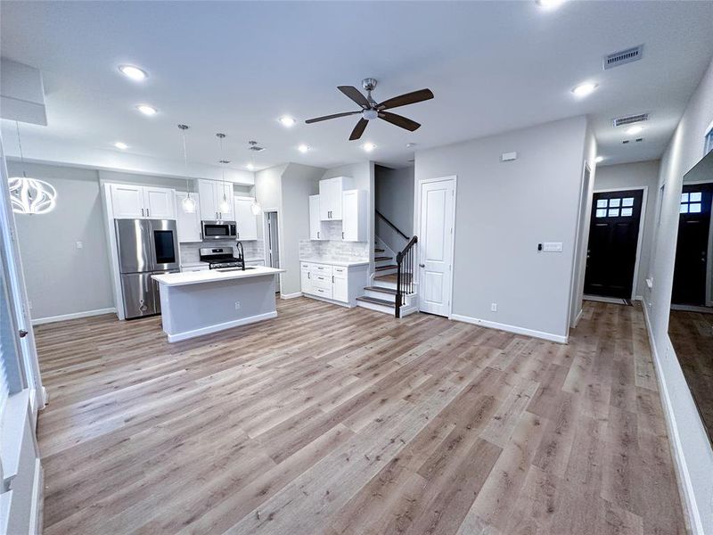 View of Living Room, Kitchen and Entrance