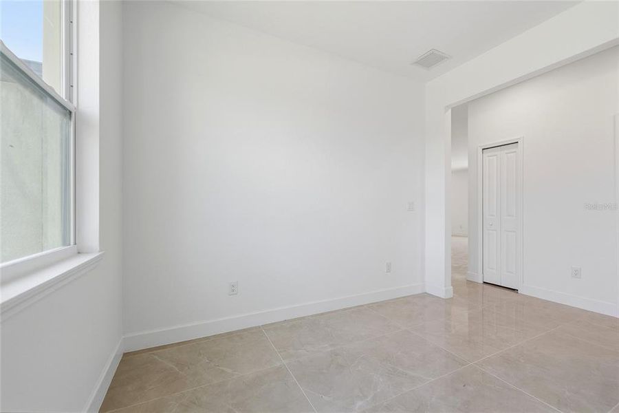 Spacious, unfurnished interior of a new home in , Port Charlotte (Image 45).