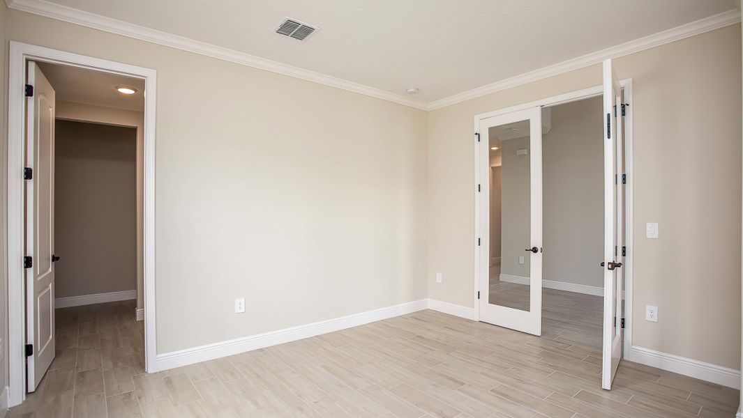 Representative unfurnished interior of a home built from the Verona by Maronda Homes in Eagle Crest, Grant-Valkaria (Image 18).