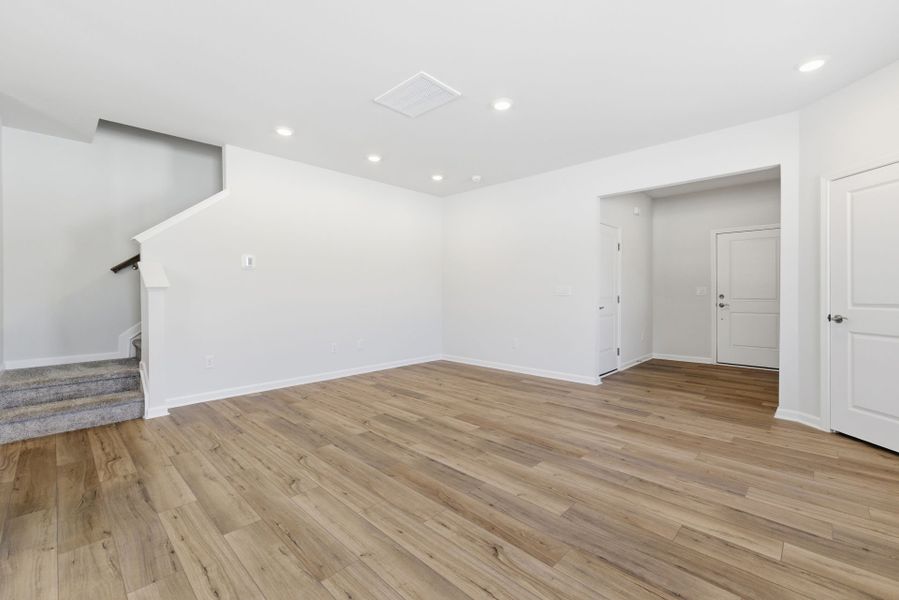 Spacious, unfurnished interior of a new home in Poets Walk, Whitsett (Image 54).