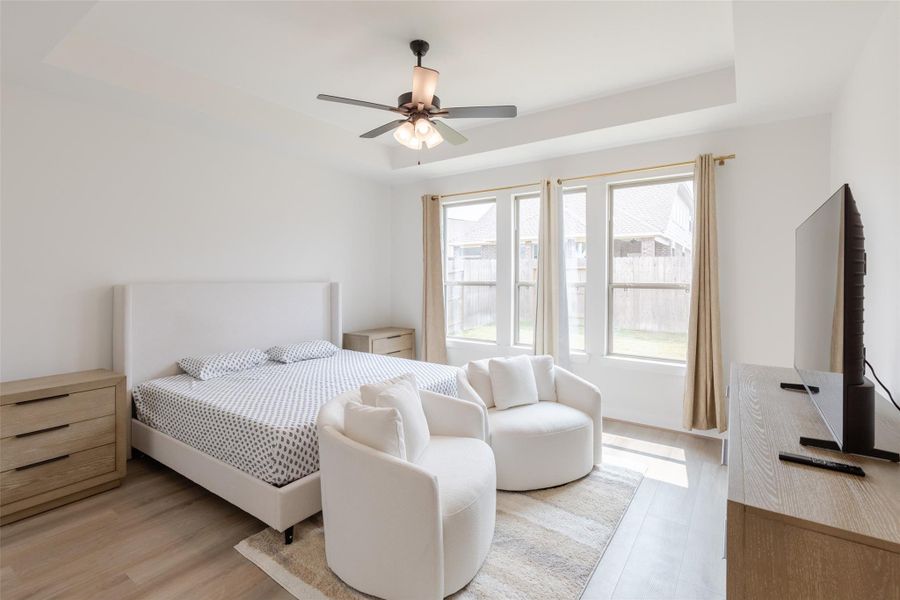 Private primary suite with abundant natural light and a relaxing, retreat-like feel