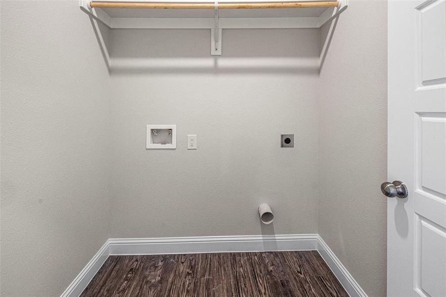 Laundry area with washer hookup, hardwood / wood-style flooring, and hookup for an electric dryer