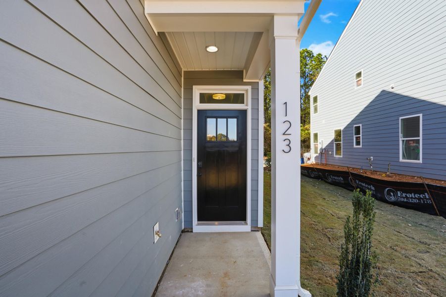 Exterior details and patio area of a home in Blythe Mill Townhomes, Waxhaw (Image 3). Exterior details and patio area of a home in Blythe Mill Townhomes, Waxhaw (Image 3).